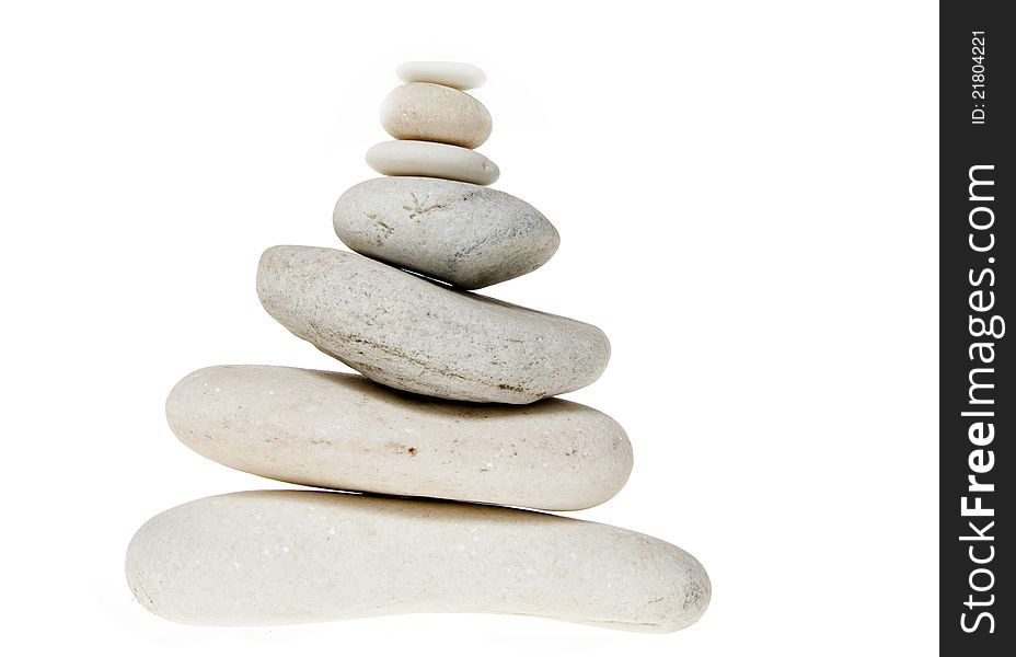 Stack of white stones balancing