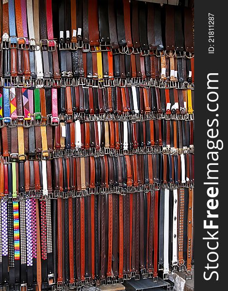 Market stall with lot of leather belts. Market stall with lot of leather belts
