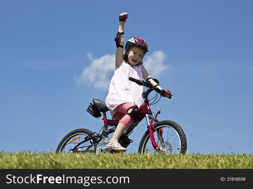 Young girl wins a bicycle race. Young girl wins a bicycle race