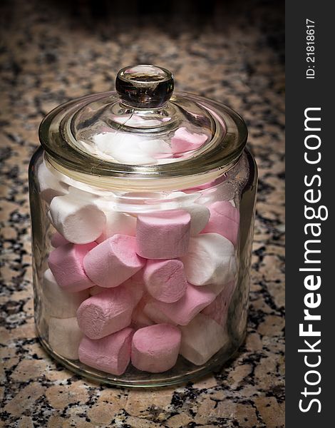 Marshmallows Jar on a stone countertop