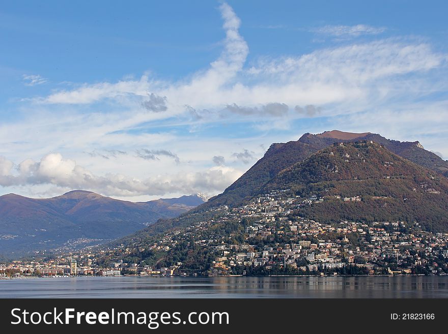 Panoramic of Lugano shoreline and Mount BrÃ¨