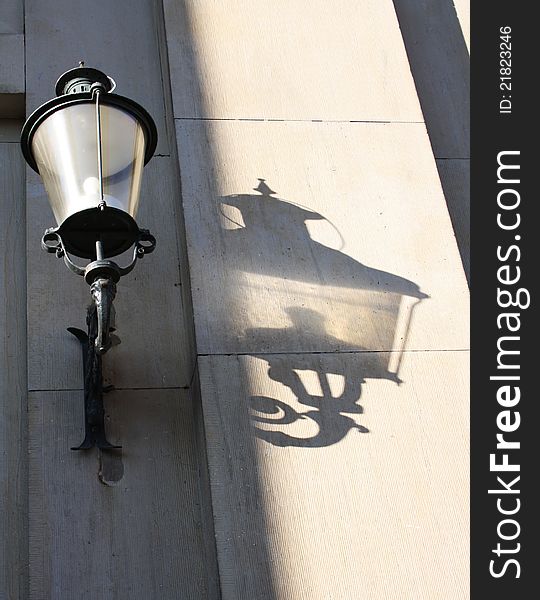 An outdoor lamp and its shadow