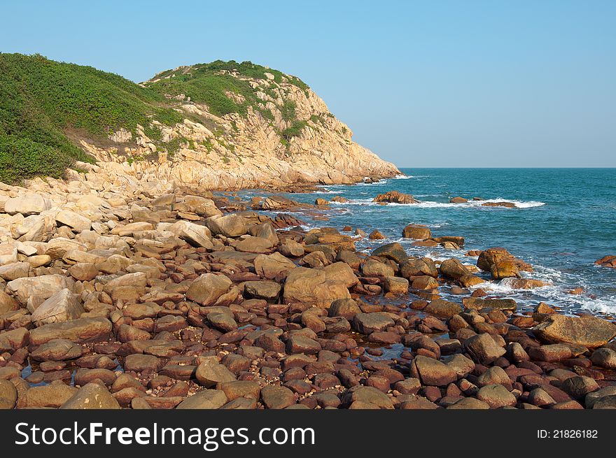 Sea side with stone and a clear sky. Sea side with stone and a clear sky