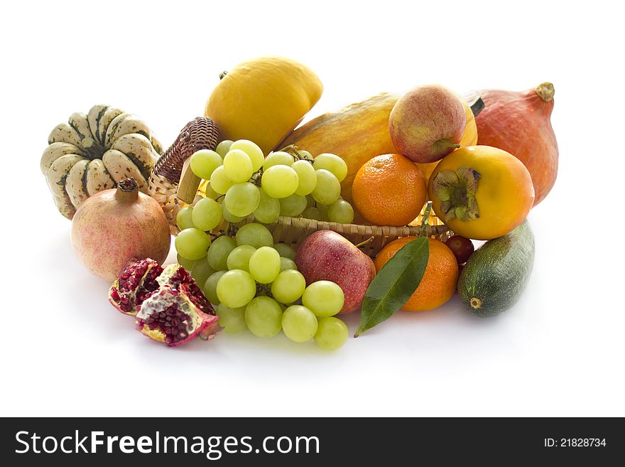 Autumn vegetable and fruits on white background