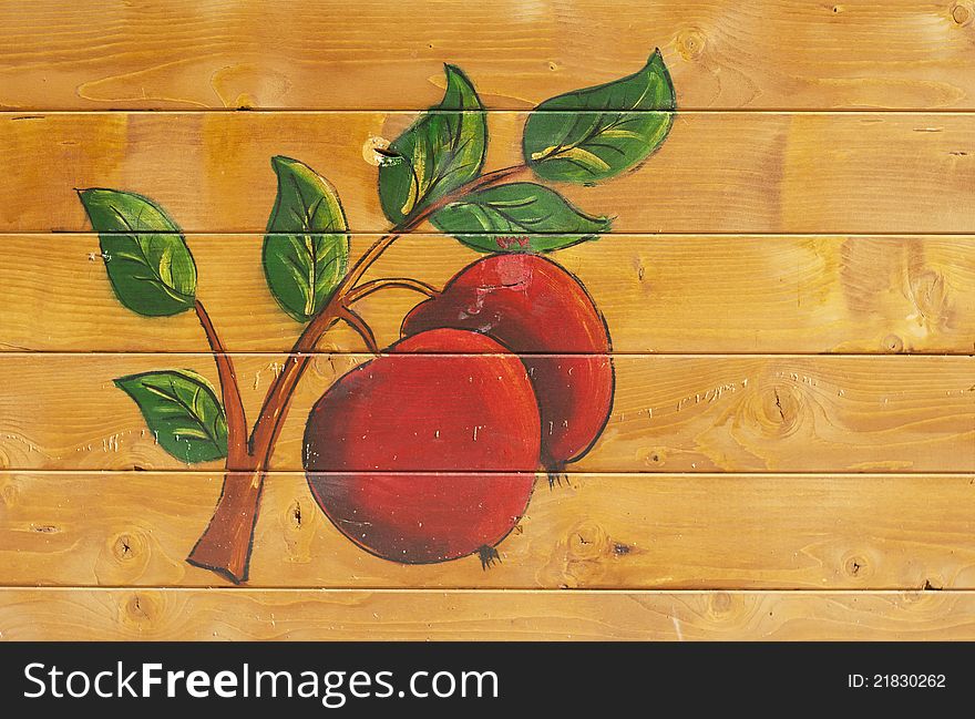 Apples branch painted on a wooden background, raw. Apples branch painted on a wooden background, raw