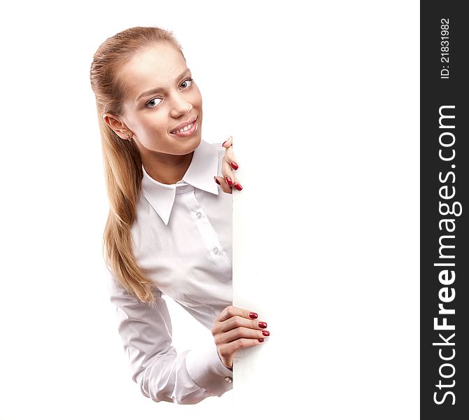 Happy smiling young business woman showing blank signboard, isolated on white background