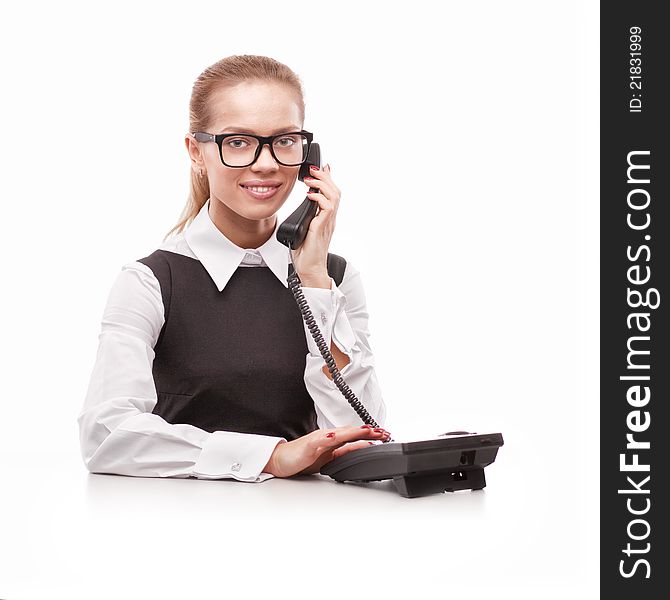 A beautiful business woman with phone on white background