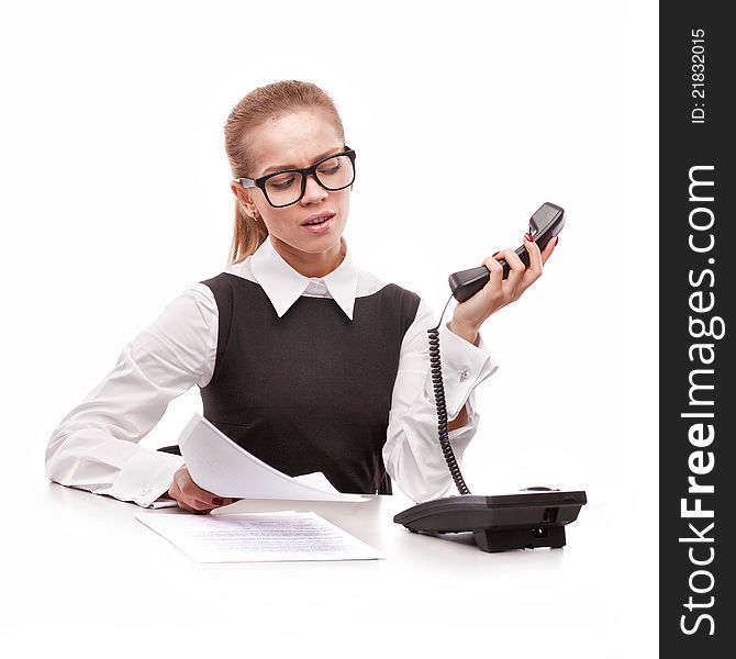 A beautiful business woman with phone on white background