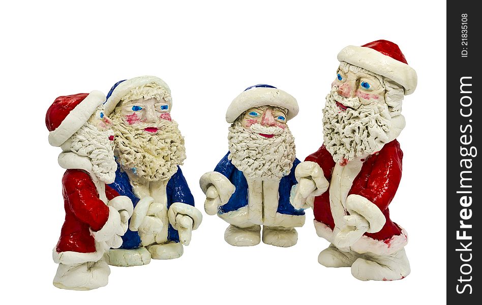 Figures Of Santa Claus Isolated On White