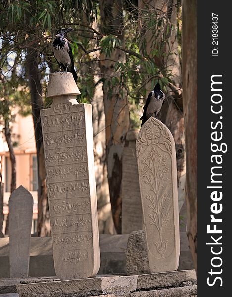 These graves in a the mosque near elli beach in rhodes show a male and female headstone - the plain blade of stone is for a femail and the stone with the turban on the top ( nearest) denotes a male burial. These graves in a the mosque near elli beach in rhodes show a male and female headstone - the plain blade of stone is for a femail and the stone with the turban on the top ( nearest) denotes a male burial