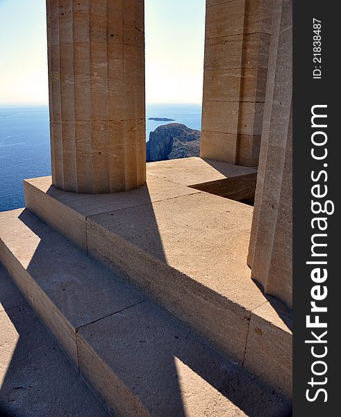 These pillars for part of the acropilis akropoli in lindos on the greek island of rhodes. These pillars for part of the acropilis akropoli in lindos on the greek island of rhodes
