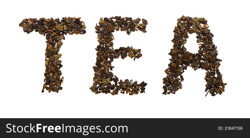 Word tea from tea leaves inscription on white background