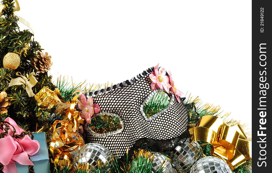 Christmas  decoration with tree gifts and carnival black mask on a white background. Christmas  decoration with tree gifts and carnival black mask on a white background