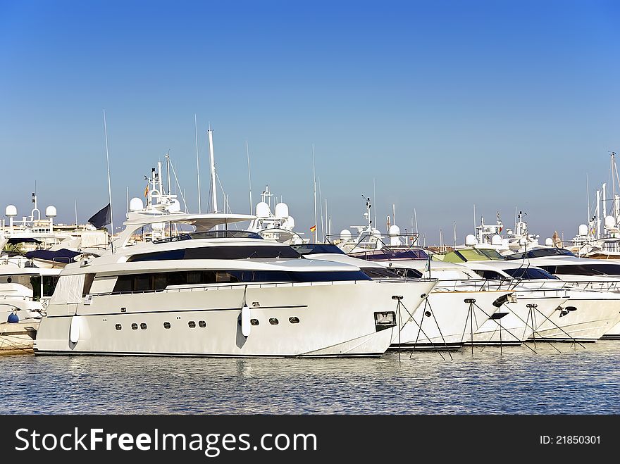 Luxury yatches standing on a yacht club in Majorca (Balearic Islands - Spain). Luxury yatches standing on a yacht club in Majorca (Balearic Islands - Spain)