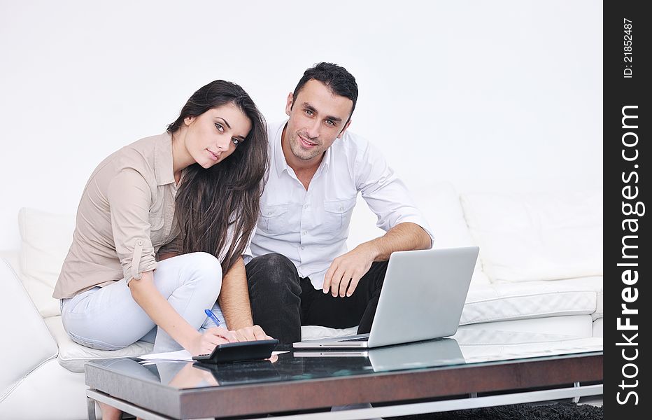 Happy young couple relax at modern home living room indoor. Happy young couple relax at modern home living room indoor