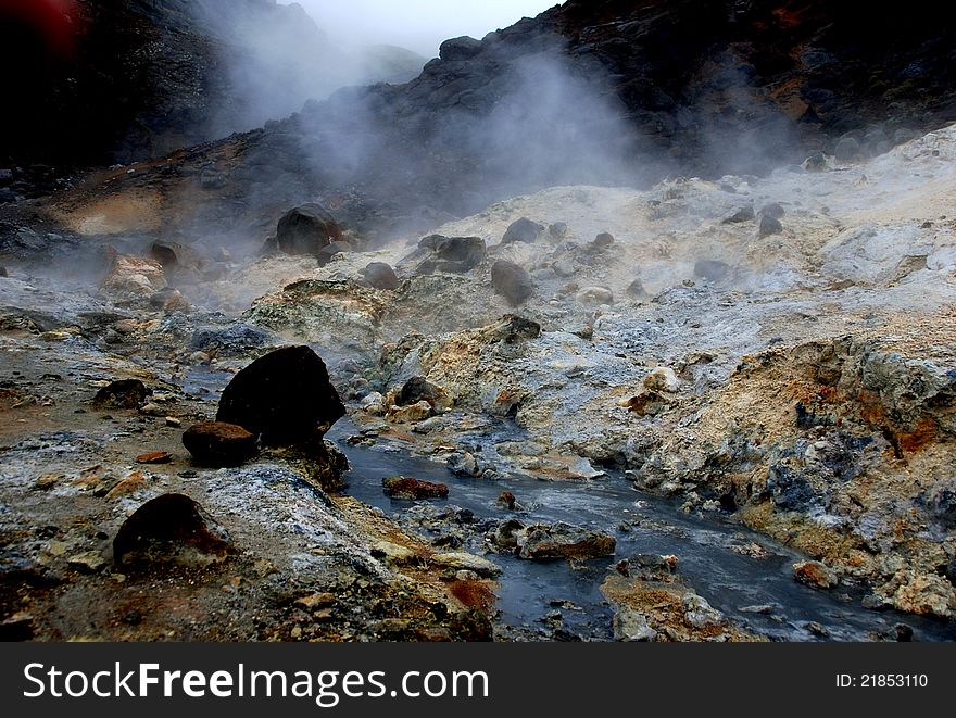 Smoke is rising from Iceland geyser