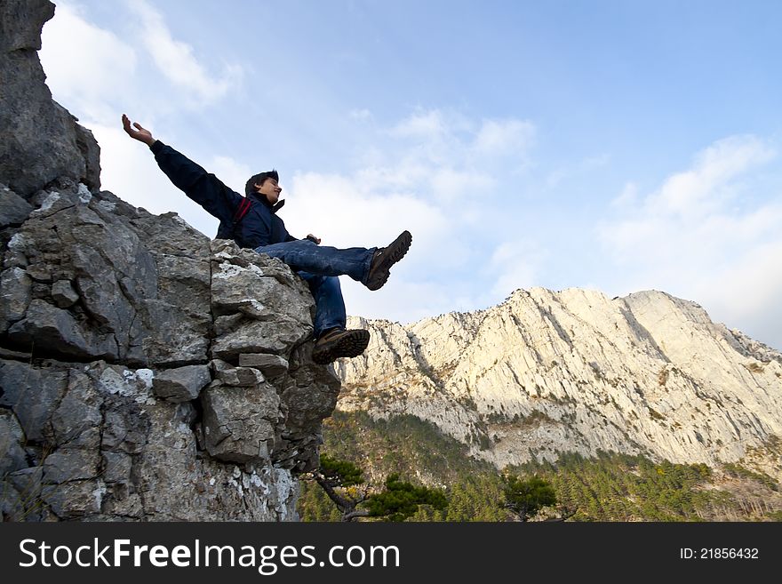 Man on top of the mountain