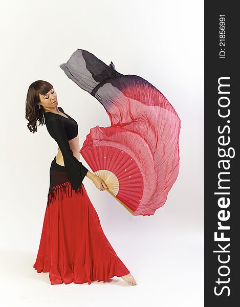 Flamanco dancer in black and red dress with fan. Flamanco dancer in black and red dress with fan