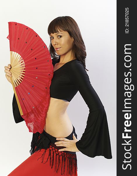 Flamanco dancer in black and red dress with fan. Flamanco dancer in black and red dress with fan