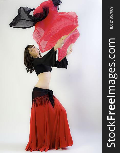 Flamanco dancer in black and red dress with fan. Flamanco dancer in black and red dress with fan