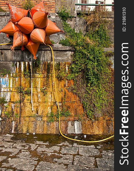 A group of mooring buoy next to the harbour in Napoli, Italy