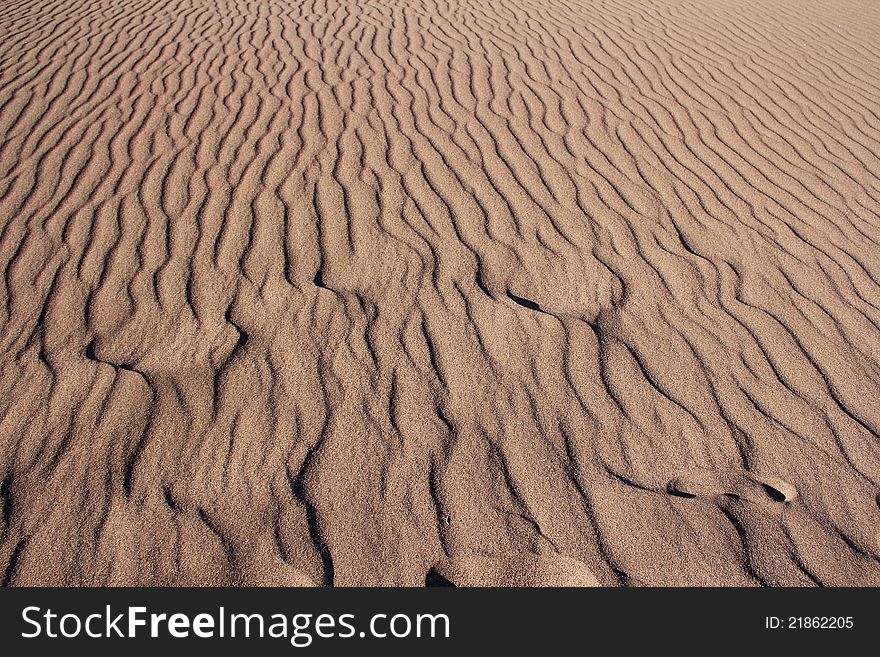 Ripples in the sand. Shadow patterns from the Atacama Desert, Chile. Ripples in the sand. Shadow patterns from the Atacama Desert, Chile.