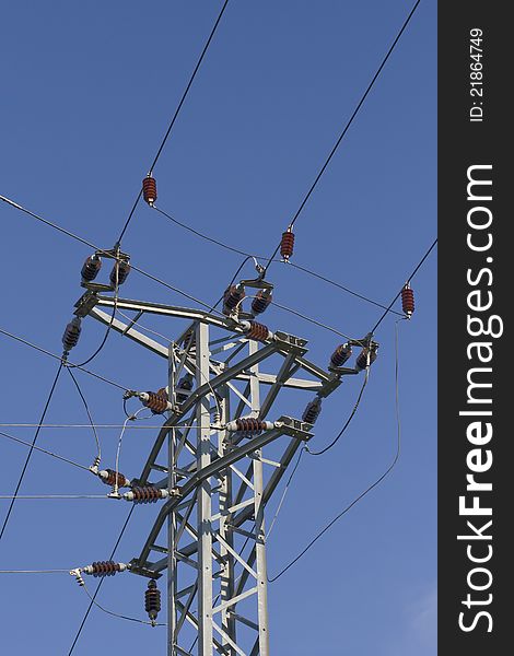 Power lines on the blue sky