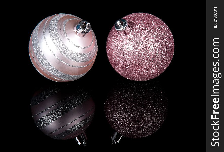 Two Christmas balls  on black