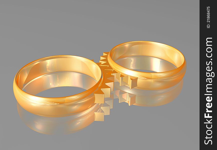 Two wedding gold rings with elements of gear wheels - a symbol of matrimonial relations. Two wedding gold rings with elements of gear wheels - a symbol of matrimonial relations.