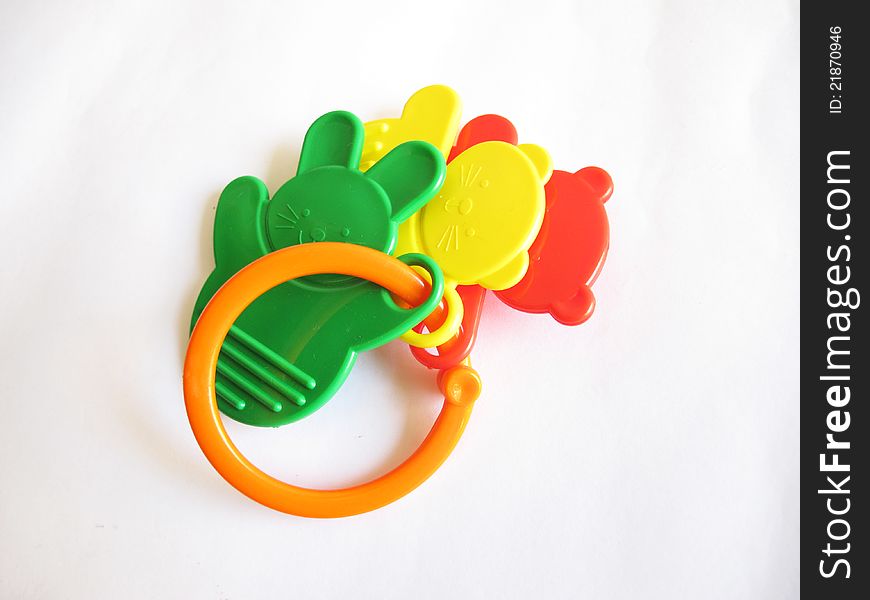A plastic toy rattle on white background.