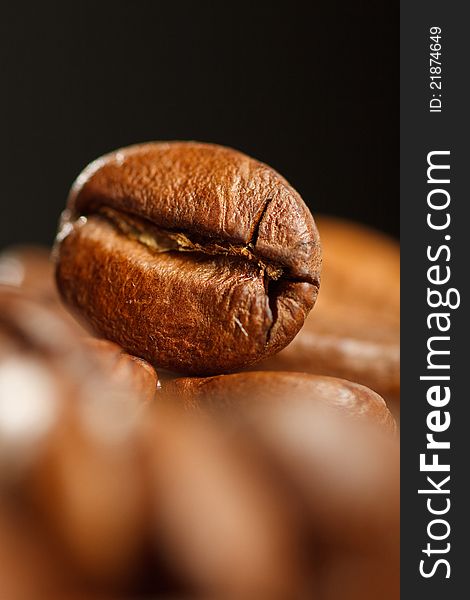 Coffee beans, photographed in black background. Coffee beans, photographed in black background