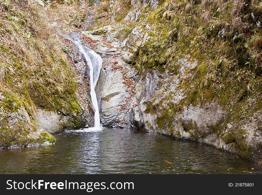 Autumn Waterfall in mountain