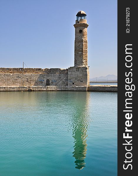 A historical lighthouse in Greek port. A historical lighthouse in Greek port