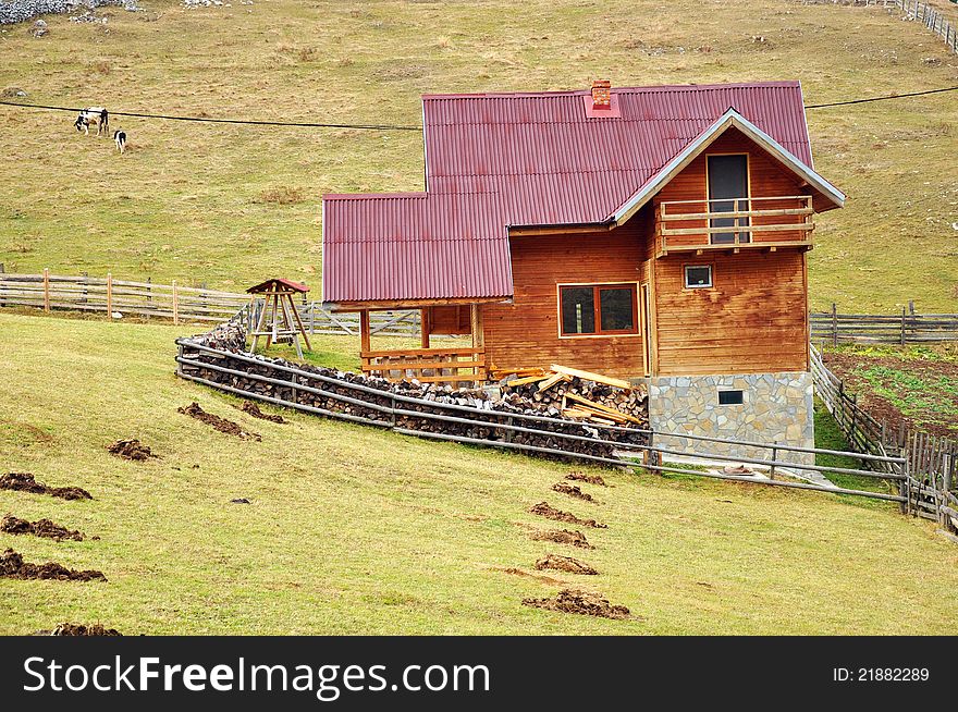 Beautiful wooden cottage in mountain forest. Beautiful wooden cottage in mountain forest