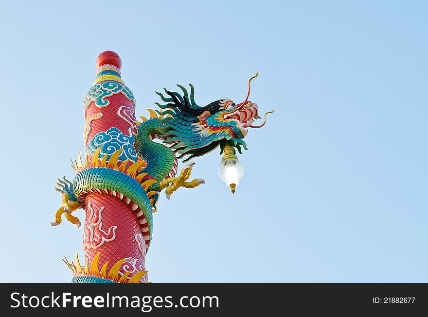 Colorful dragon statue at Chinese shrine ,Thailand and blue sky background