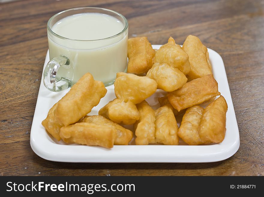 Deep Fried Dough Sticks And A Cup Of Soybean Milk