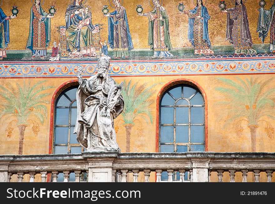Statue of a Saint on the balcony of a church in Rome, Italy. Statue of a Saint on the balcony of a church in Rome, Italy.