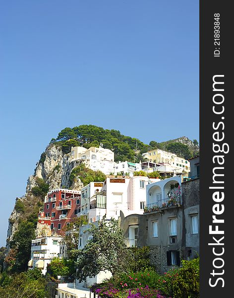 An image of villas on a hillside in Capri, Italy. An image of villas on a hillside in Capri, Italy