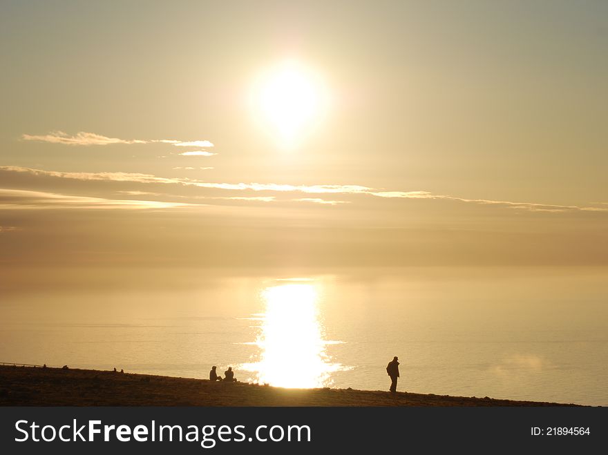 View of the sun at midnight at the Cape Nordkapp. View of the sun at midnight at the Cape Nordkapp