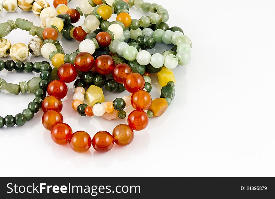 Colorful crystal beads on white. Colorful crystal beads on white.