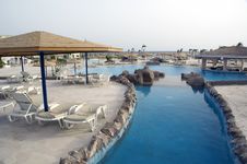 Resort Pools At A Sunrise Royalty Free Stock Photo