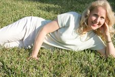 Blonde Woman Laying In Grass Royalty Free Stock Image