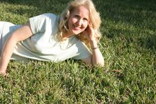 Woman Laying In Grass Copyspac Stock Photography Woman Laying In Grass Copyspac Stock Photography