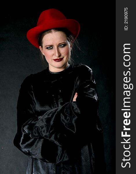 Women in red hat. Make-up retro black background. Women in red hat. Make-up retro black background.