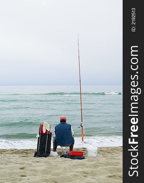 Fisherman waiting to catch something in Tuscany