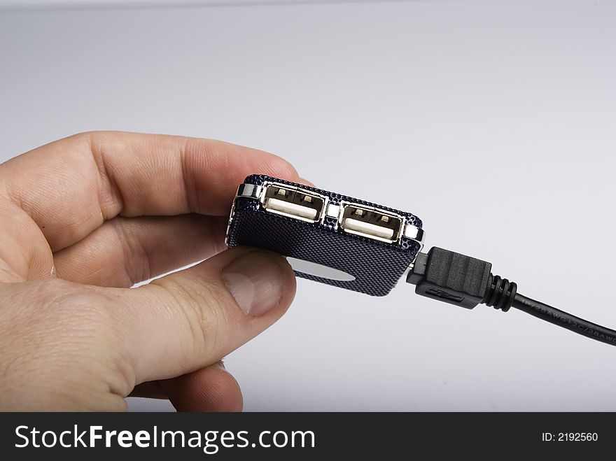 Usb hub hold by hand on a white background