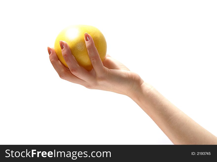 White grapefruit in graceful woman's hand. White grapefruit in graceful woman's hand