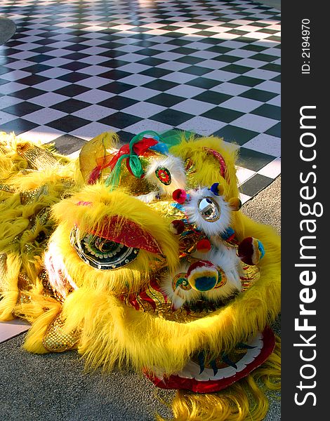 Resting dragon head laying on the floor chinese holiday,. Resting dragon head laying on the floor chinese holiday,
