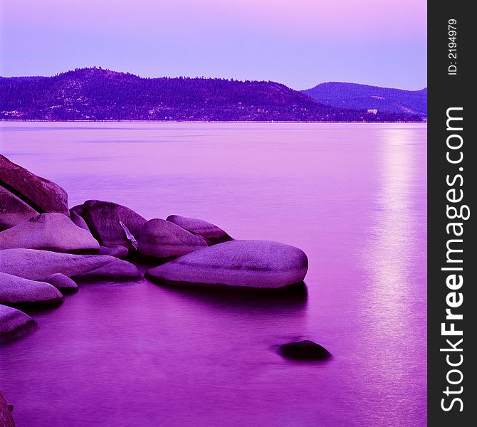 Lake Tahoe at sunset with purple colors