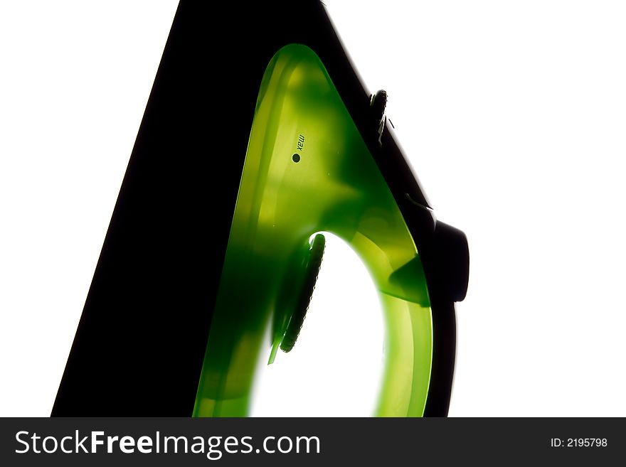 Green flat iron on white background